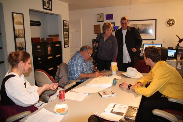 Pre-production meeting with client, talent and shooting crew.